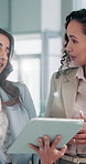 Business, discussion and women with tablet in office for finance review, account feedback and risk assessment. Financial analyst, teamwork and digital report for budget update and revenue forecasting