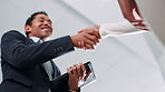 Handshake, greeting and business people in office for deal, negotiation or thank you. Meeting, partnership and financial manager with client with shaking hands for investment contract in workplace.