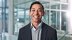Office, businessman and face of accountant with smile, confidence and professional career in corporate. Happy, male person and financial consultant in portrait for about us, company growth and pride