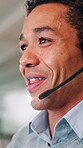 Headset, man and customer service in office with computer, communication and online consulting. Typing, advice or call center for CRM contact support, discussion or sales agent for hotline business