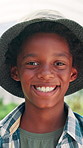 Greenhouse, smile and face of black child with farming for harvest, growth or sustainability. Happy, agriculture and portrait of African boy kid with pride for planting organic produce in environment