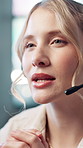 Woman, discussion and headset at call center with customer support, advice and consulting at office. Person, agent and service at help desk, contact us and microphone with voip tech at workplace