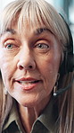 Mature woman, talking and call center with headset, closeup and advice with customer service at insurance agency. Person, consultant and voip with microphone, contact us and help desk at office