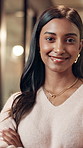 Face, confident and happy business woman in office at night for ambition with social media marketer. Portrait, arms crossed and creative professional, worker or platform promotion specialist in India