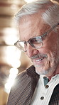Office, mature man and thinking with tablet for reading, research and online results with smile. Professional, career and male editor with digital for scroll article, blog and info with idea in lobby