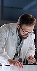 Lab, scientist and man with interactive display, online or research on website or gene sequence. Clinic, medical professional and person with tech for forensic science, analysis or review of evidence