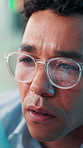 Man, glasses and computer in office for coding, software development and problem solving. Reflection, programmer and face in agency for cybersecurity, programming update and thinking with technology