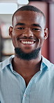 Happy, face or black man with confidence at library for knowledge, academic development or research. Portrait, male person or university professor with smile for career, job or future growth in study
