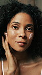 Skincare, face and woman with cream, moisture and morning routine for vitamin c, confident or shine. Wellness, glow and lotion for antiaging benefits, dermatology or person with product for self care