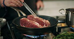 Cooking, hands and meat in frying pan in kitchen for meal preparation, enhance flavor or render beef moisture. Chef, person or steak recipe with tweezer for healthy protein, nutrition or food in home