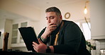 Stress, man and chef with tablet in home for cooking with recipe on mobile food application. Kitchen, digital technology and male culinary artist with research on tips, instructions and ingredients.