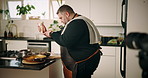 Man, chef and cheese with video, recording and grater in kitchen with dairy product for cooking show in home. Person, tutorial and influencer with content creation, profile and meat for meal in house
