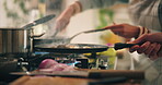 Cooking, frying pan and hands of couple in kitchen of home for preparation of meal or supper. Food, ingredients and recipe with chef people at apartment counter for diet, health or nutrition closeup