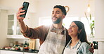 Love, selfie and smile with couple in kitchen of home together for bonding, cooking or memories. App, profile picture or social media with man and woman hugging in apartment for mobile photography