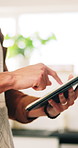 Person, hands and chef with tablet for online recipe, ingredients or cooking tutorial at home. Closeup, research and technology with checklist or app for hospitality, catering or food preparation