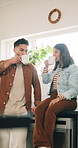 Morning, coffee and couple in home kitchen with conversation, cup and mug for drink. Discussion, communication and love of people with smile , house and marriage talking for breakfast plan with tea