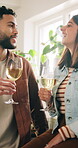 Wine, smile and couple in kitchen for date, dinner or lunch in home together. Laughing, man and woman drinking alcohol beverage with cheers, funny joke or bonding for afternoon meal or anniversary