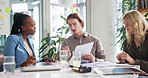 Planning, meeting and business people with documents for research, project and proposal. Creative startup, professional and men and women with paperwork for marketing, advertising and brand strategy