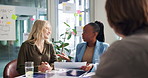 Planning, meeting and business people with paperwork for proposal, project and research. Creative startup, professional and men and women with documents for marketing, advertising and brand strategy