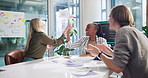 Celebration, paper and business people with applause, smile and success with profit growth. Achievement, employees and group in workplace, documents and b2b deal with funding approval and clapping