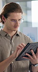 Man, tablet and talking at startup, office and project management for review with insight at agency. Person, digital touchscreen and smile with application, feedback and check notification at company
