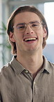 Face, business and man in office, funny and confidence with creativity, laughing and smile. Portrait, happy person and journalist in workplace, news reporter and humor with project, joke and editor
