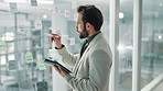Business, glass wall and man with tablet, writing and connection with online schedule. Person, employee and consultant in workplace, tech and ideas for company website and brainstorming for project