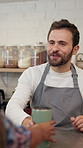 Barista, customer and hands with takeaway coffee for order, espresso or latte at sustainable shop. Travel mug, cafe and man with beverage for drink, service and giving reusable cup for zero waste