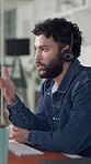 Headset, man and call center consultant in office for communication, contact us or help desk. Technology, customer service and male agent talking with online discussion for crm support in workplace.