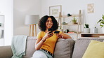 Woman, phone and happy with credit card on sofa for online shopping, banking purchase and easy transaction. African person, relax and smile with smartphone for digital payment and ecommerce in home