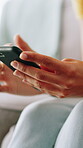 Hands, woman and typing with phone at house for communication, social media and texting message. Closeup, person and mobile with internet search, online information and reading for chat notification 