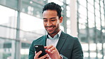 Phone, business man and reading in office for investment banking, finance and scroll online. Corporate worker, smile and check email on mobile for profit update, economy news and stock price in lobby