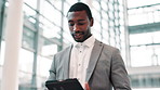 Tablet, business man and walking in office for investment banking, finance and budget online. African worker, digital technology and reading email for profit update, economy growth and stock price