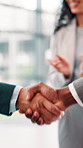 Business people, handshake and applause in office for agreement, investment deal or achievement. Employee collaboration, shaking hands or support in firm for company merger, partnership or promotion