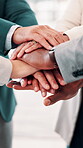 Business people, hands and stack in office for teamwork, company collaboration and support. Corporate group, huddle and gesture in workplace for partnership, community development and cooperation