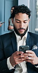 Business man, phone and texting at office for contact, deal or market update at trading company. Mature person, smartphone and financial advisor with click on mobile app at private investment agency