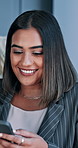 Woman, smile and smartphone with texting at office, contact and excited for deal at finance agency. Person, phone and happy on mobile app, notification and review proposal at investing company