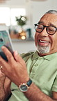 Senior, happy man and sofa with phone for online entertainment, word search or game at home. Elderly, male person or pensioner laughing with mobile smartphone for funny subscription or connection