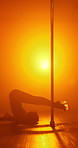 Stripper, neon light and woman pole dancing in night club for performance, sexy and flexible on floor. Erotic dancer, person and moving on stage for burlesque, sensual art and exotic entertainment