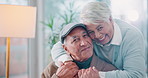 Face, hug and retirement with senior couple in living room of home together for bonding. Happy, love or smile with old man and woman embracing in apartment for relationship, relax or romance