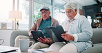 Budget, clipboard and tablet with senior couple on sofa in living room of home together. Documents, finance or pension with old man and woman in apartment for insurance, investment or savings