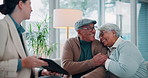 Clipboard, good news and senior couple with financial advisor on sofa in living room of home. Budget, consulting or excited with broker, old man and woman in apartment for insurance or investment