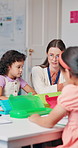 Help, teacher and woman in classroom, learning and conversation with advice, teaching and kids. Person, education and employee in school, discussion and knowledge with academic growth and development