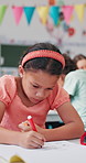 Writing, student and child with exam, classroom and knowledge for project, growth and development. Elementary, studying and kid with notebook for test, learning or girl with information for education