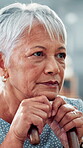 Cane, sad and old woman with thinking in nursing home for memory, nostalgia and lonely in retirement. Face, walking stick and elderly person with depression for grief, remember and mourning widow