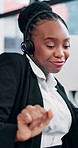 Happy, black woman and consultant dancing with headset for winning, promotion or good news at office. Excited, female person or agent with smile or energy for business success or sale at call center