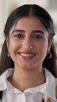 Face, creative and happy business woman in office, journalist and reporter. Portrait, smile and professional writer at work for publication, news editor and confident employee at startup in Dubai