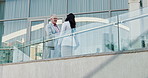 Business people, greeting and handshake in city for meeting, smile and agreement on balcony. Building, team and shaking hands outdoor for collaboration, partnership and opportunity for negotiation