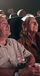 Happy, drink and senior couple in cinema for movie on date together for anniversary celebration. Love, laughing and elderly woman with man for watching film for entertainment at theater with beverage