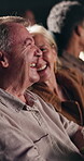 Laughing, funny and senior couple in cinema for movie on date together for anniversary celebration. Love, entertainment and elderly woman with man watching comedy film at theater in audience.